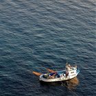 La barca da pesca ed i gabbiani