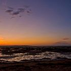 La plage de Ronce-les-Bains à marée basse après le coucher du soleil