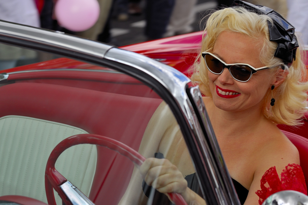 Lady in red car