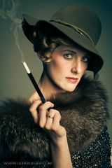 Lady with hat and cigarette