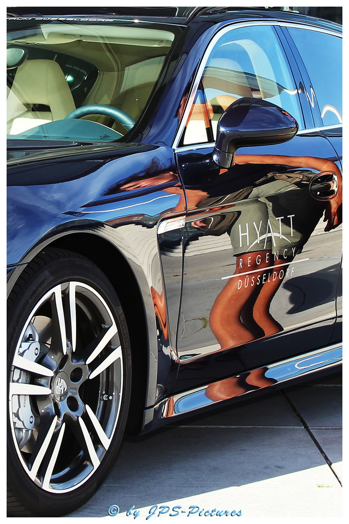 Lady with Porsche "Panamera S" at Hyatt Regency