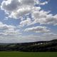 Land und Wolken