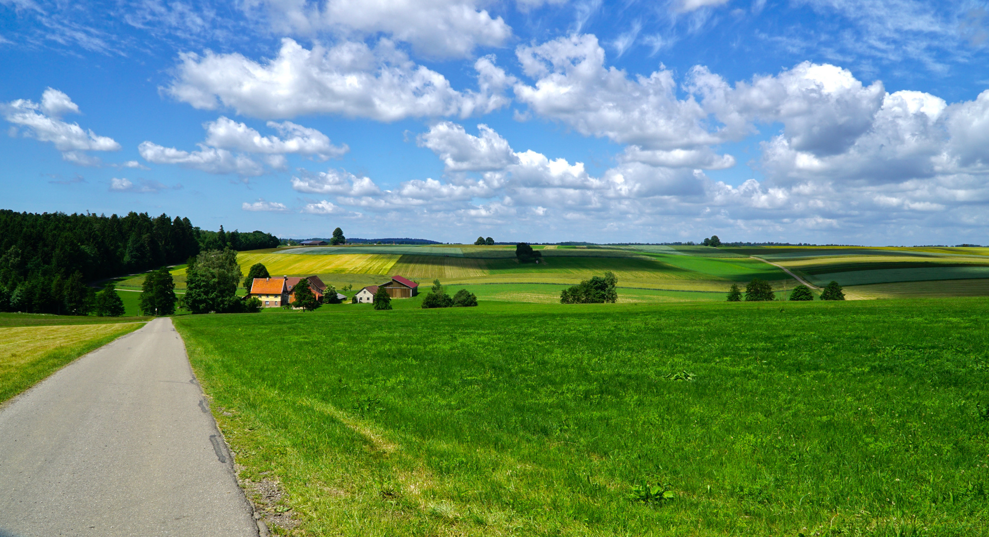 Landschaft mit Bauernhof