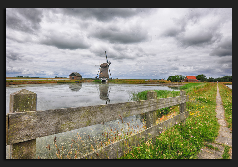 Landschaft mit Mühle