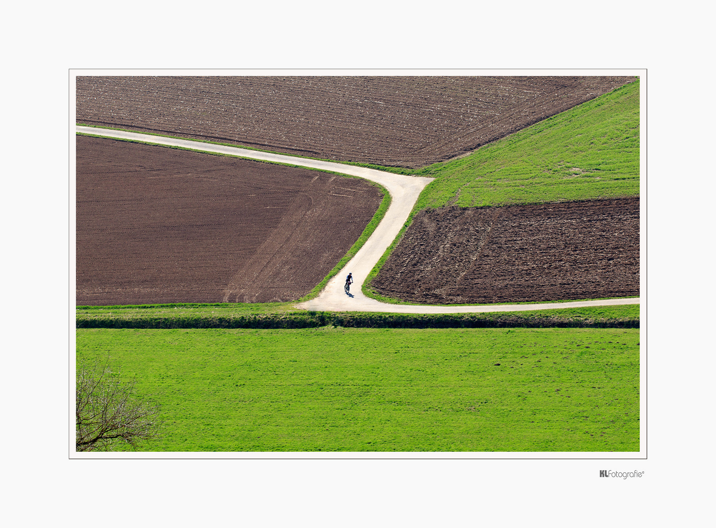 Landschaft mit Radler