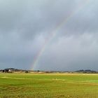 Landschaft mit Regenbogen