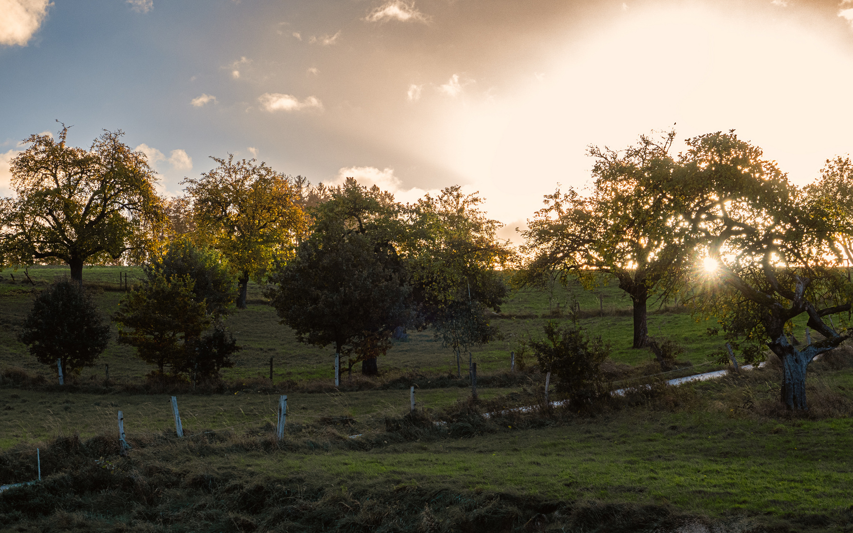 Landschaft mit Sonne