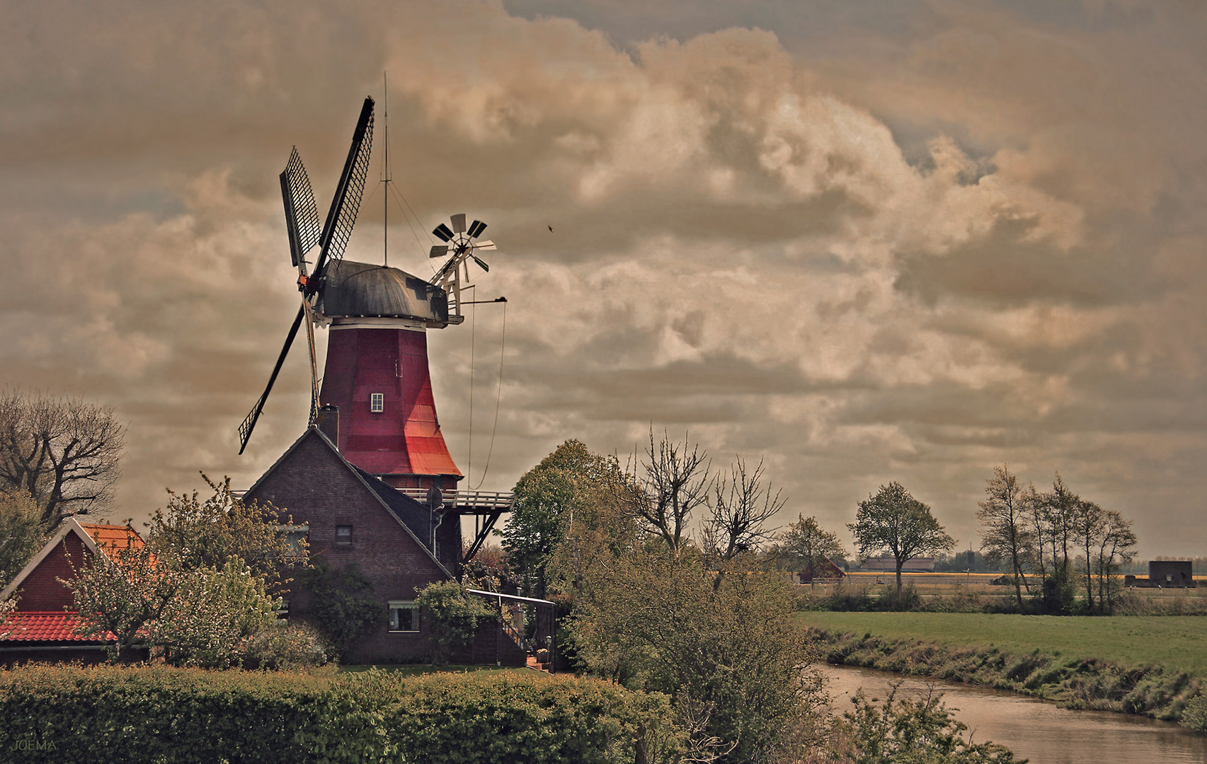 Landschaft mit Windmühle