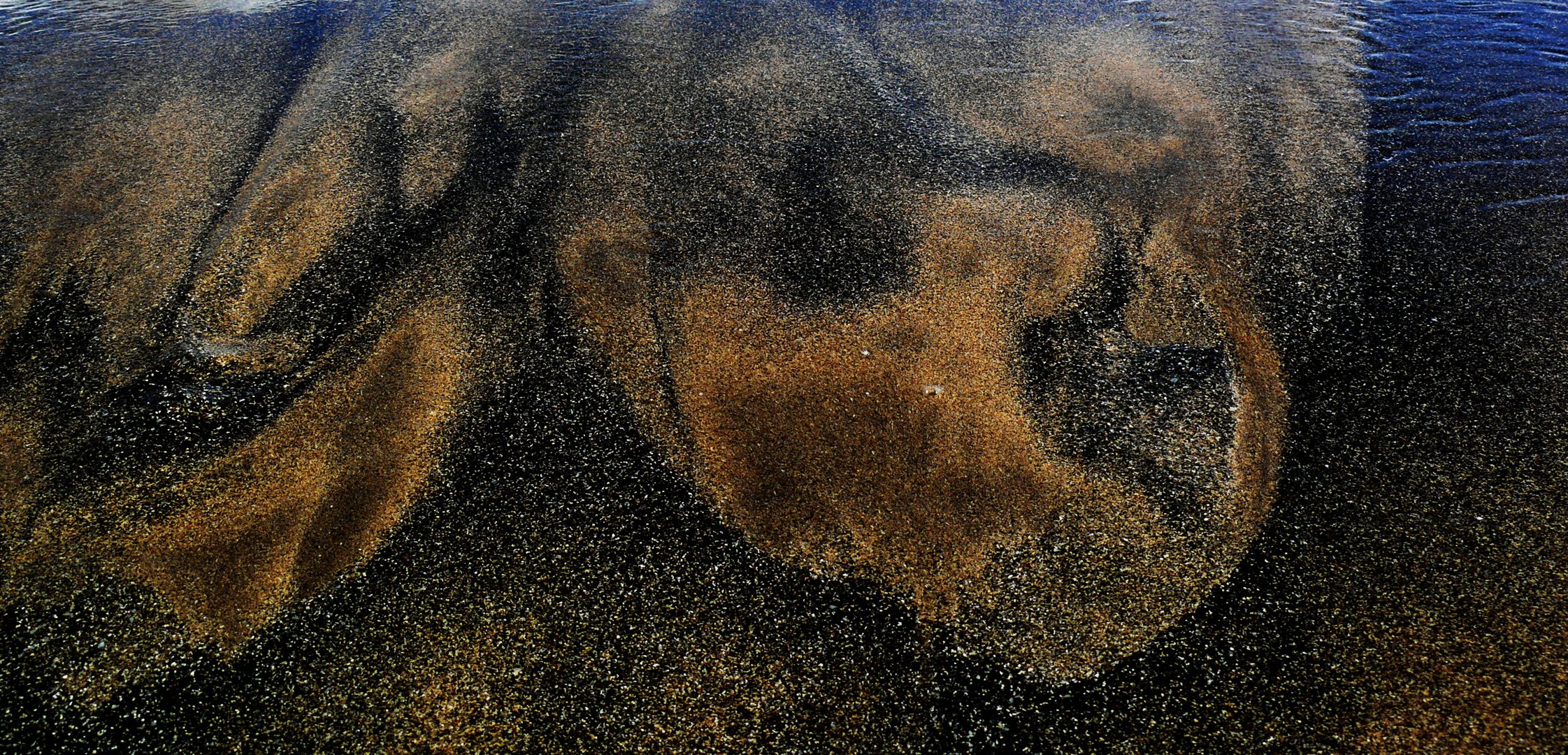 Lanzarote - Jede Minute sieht er anders aus, der Sand am Strand