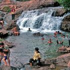 Laos peple enjoy playing in the Khone fall pool