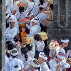 Large crowds enter the courtyard