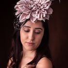 Large flower fascinator and a girl