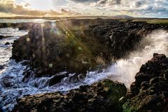 Lava beach reflections