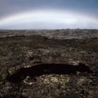 Lava Tube mit Regenbogen.