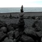 Lavasteine am Strand von Puerto Naos