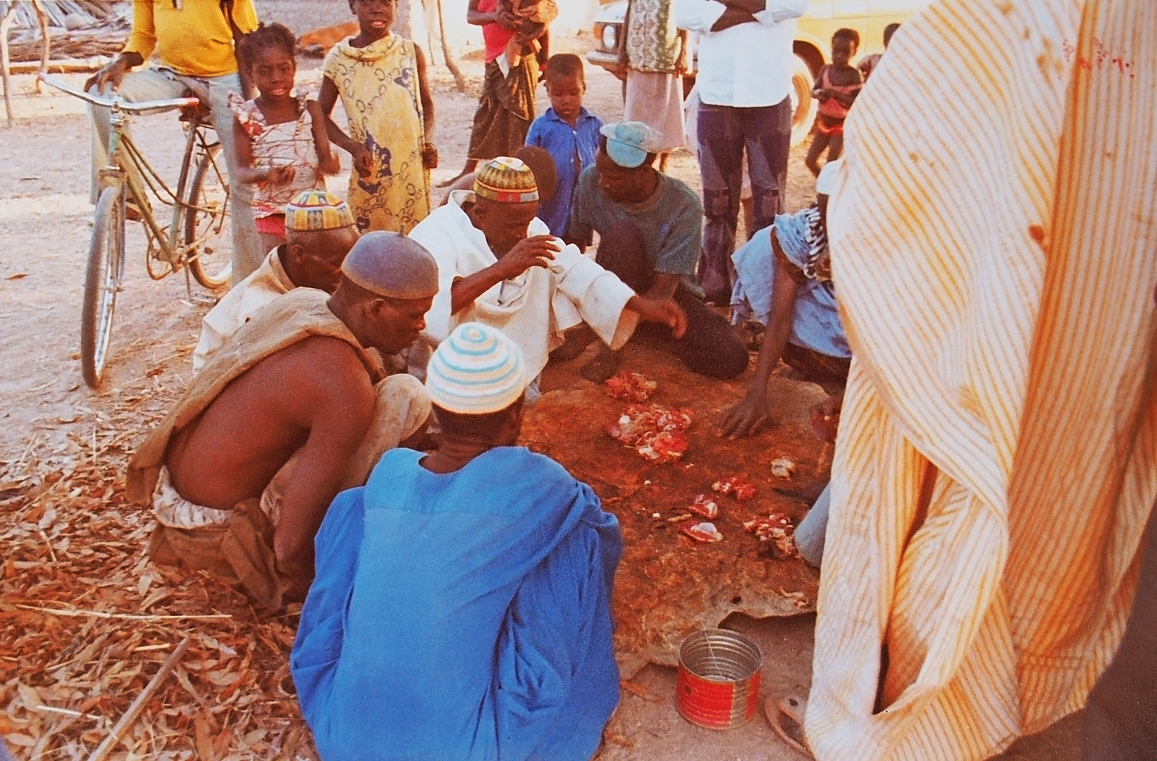 Le partage de la viande dans un village  malien