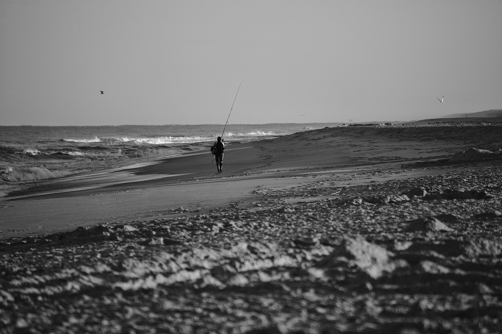 Le pêcheur de la plage