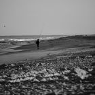 Le pêcheur de la plage