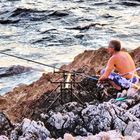 Le pêcheur des rochers