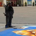 Le peintre des rues et son téléphone portable