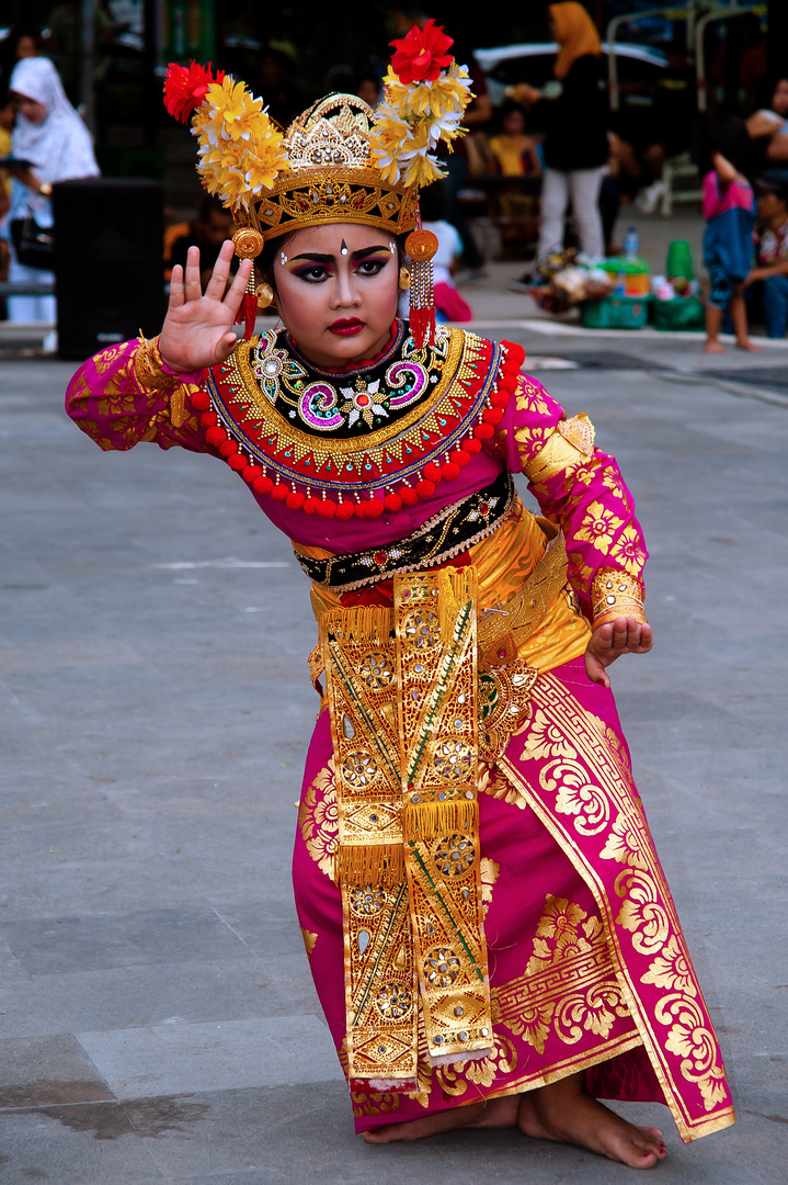 Legong dancer girl at Pututan Square