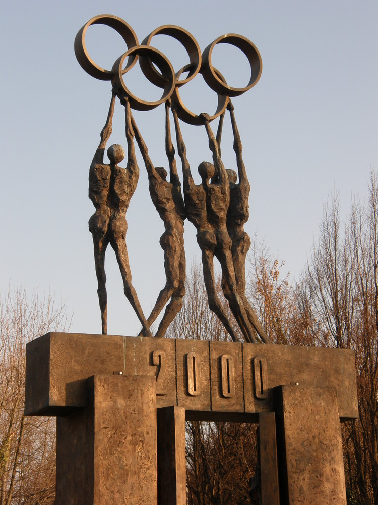 Que représentent les anneaux olympiques?