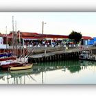 Les cabanes bleues du port