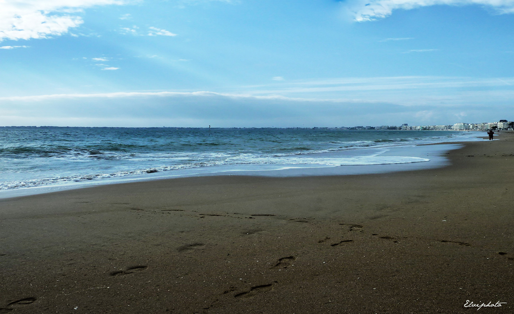 Les pas sur la plage