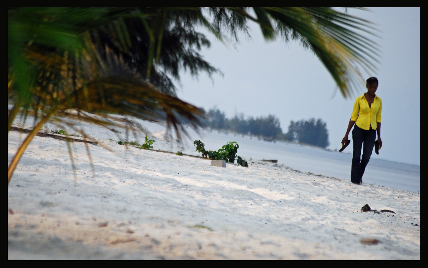 Les pieds dans le sable