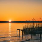 Letzte Sonnenstrahlen am See