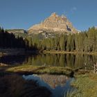 Letzter Blick zu den Drei Zinnen, herrlich strahlen und spiegeln sie sich in der Abensonne,...