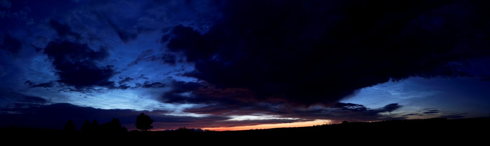 Leuchtende Nachtwolken Sunset