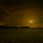 Leuchtturm auf einem Feld