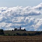 Leuchtturm Bastorf bei Kühlungsborn mit imposanten Wolken