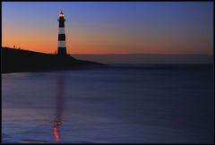 Leuchtturm bei Nacht