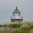 Leuchtturm hinter Düne