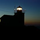 Leuchtturm im ersten Licht