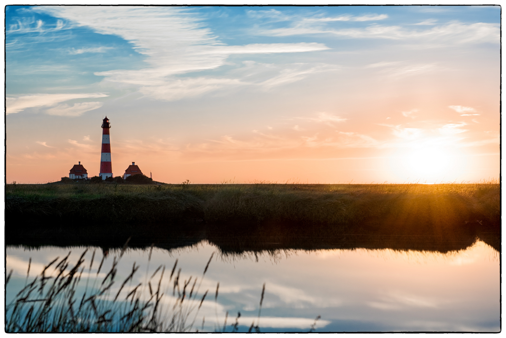 Leuchtturm in Westerhever bei Sonnenuntergang