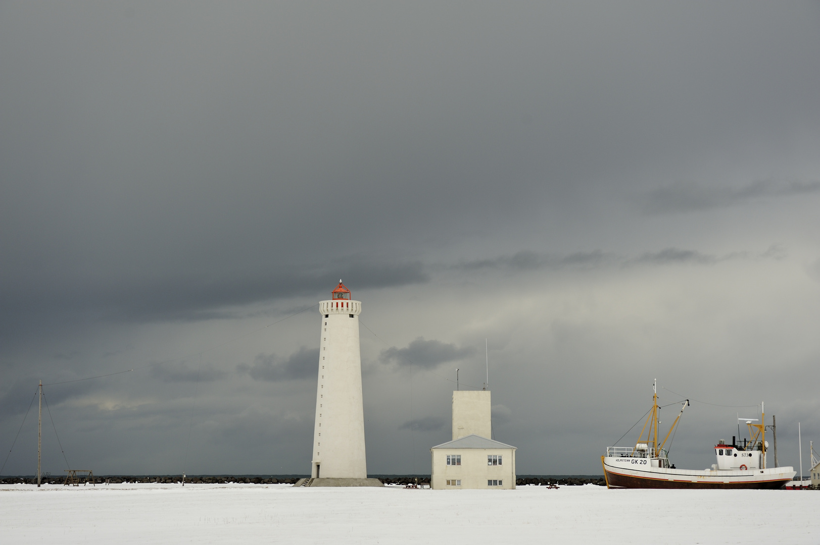 Leuchtturm mit Boot