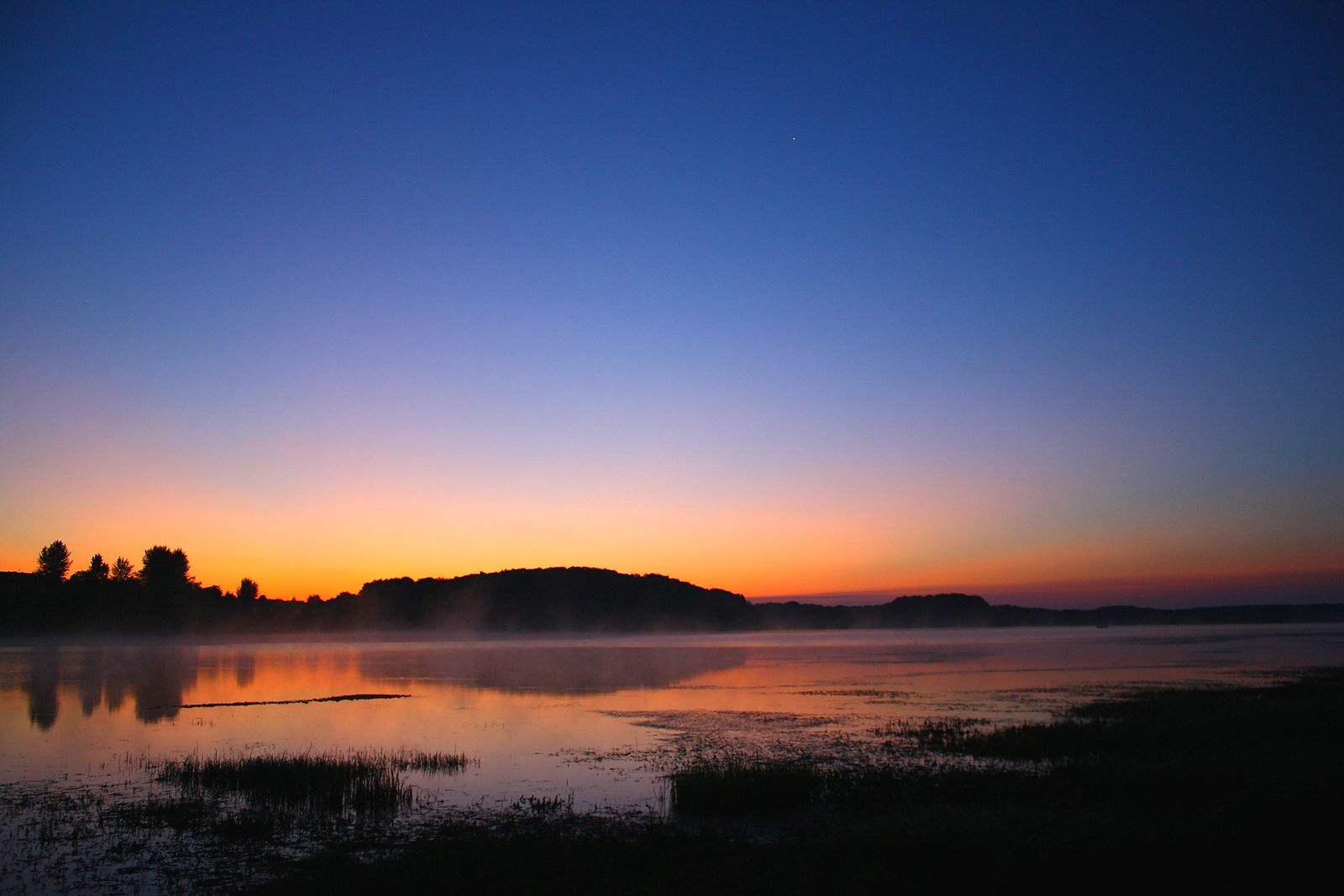 Lever de soleil sur le lac de Michelbach