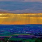 Lichtfluten über dem Kitzinger Land vom Schwanberg aus