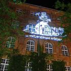 Lichtkunstprojektion Rathaus Kassel Karikatur K+S AG