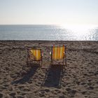 Liegestühle am Strand