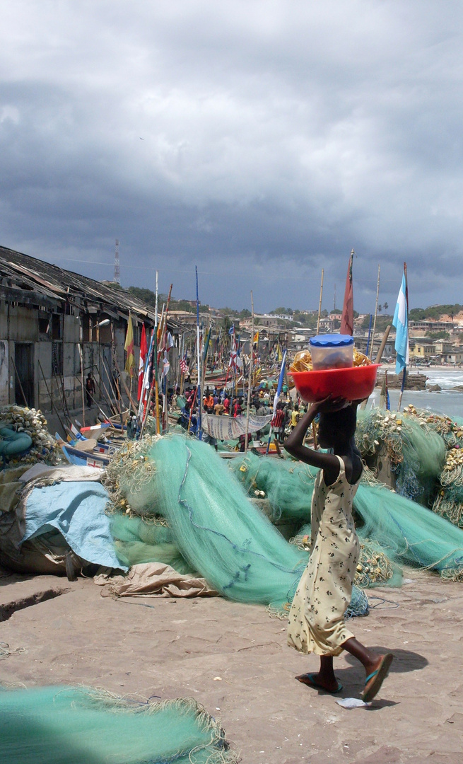 Life at the foot of Cape Coast Castle