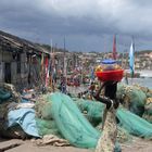 Life at the foot of Cape Coast Castle