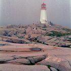 Light house in morning fog