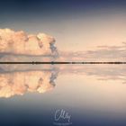 Lighthouse And Clouds