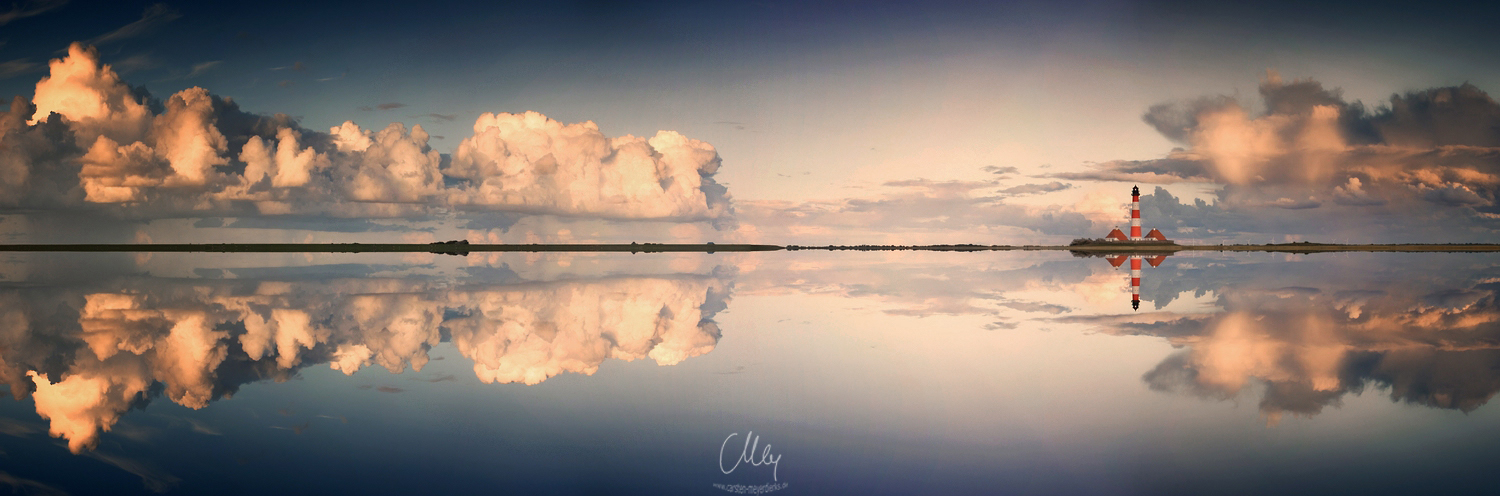 Lighthouse And Clouds