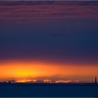 Lighthouse and ship