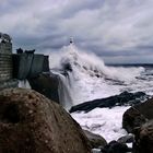 lighthouse in waves